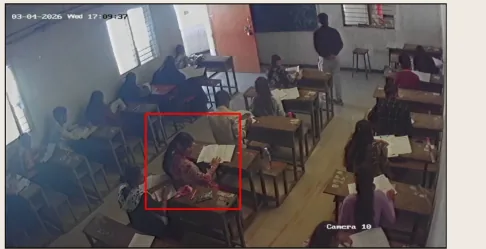 AI exam proctoring flagging a student for copying during an exam on a school's existing CCTV camera